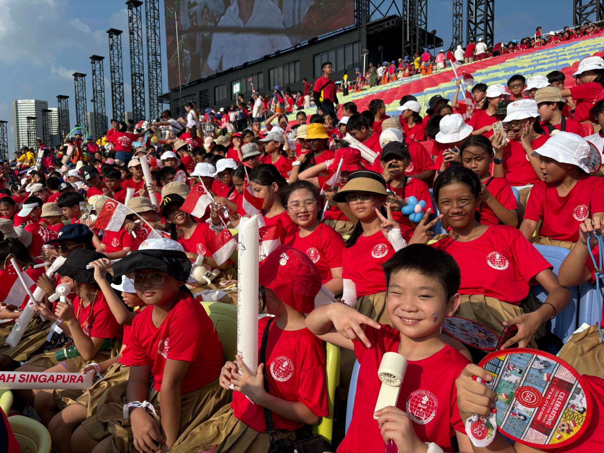 P5 student at NE show in Kallang Wave